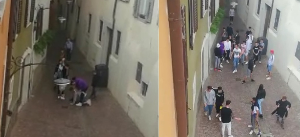 Scontro tra gruppi in centro a Trento, un ragazzino preso a calci in testa rimane a terra