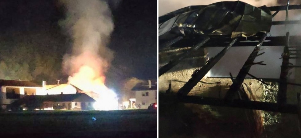 Un edificio avvolto dalle fiamme, paura nella notte