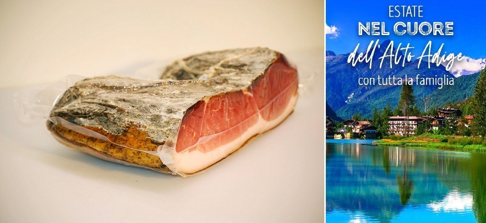 Foto d'archivio Nella pubblicità dello speck altoatesino c'è il lago di Alleghe nel Bellunese