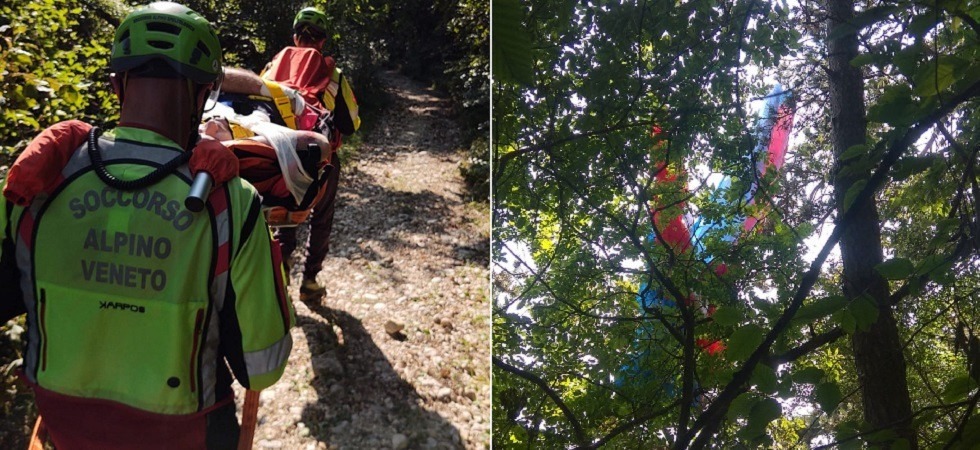 Scontro in quota tra due parapendii: uno precipita e il pilota resta bloccato fra gli alberi