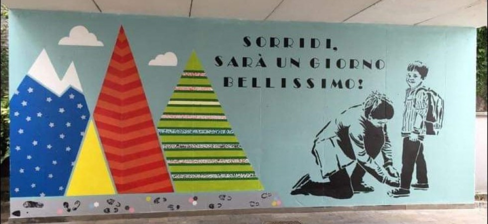 "Sarà un giorno bellissimo": ecco il murale davanti alla scuola di Isera