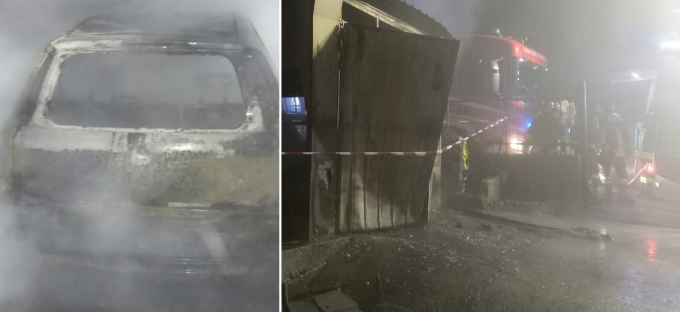Incendio nella notte, le fiamme avvolgono e distruggono un'auto e un garage