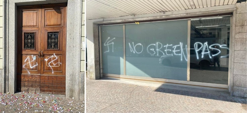 Scritte No green pass e svastiche: imbrattate le porte del Comune e l'ingresso della scuola