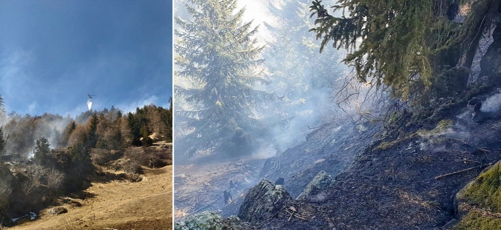 Ennesimo rogo, il bosco brucia in una zona impervia: l'elicottero interviene mentre i vigili del fuoco avanzano a piedi