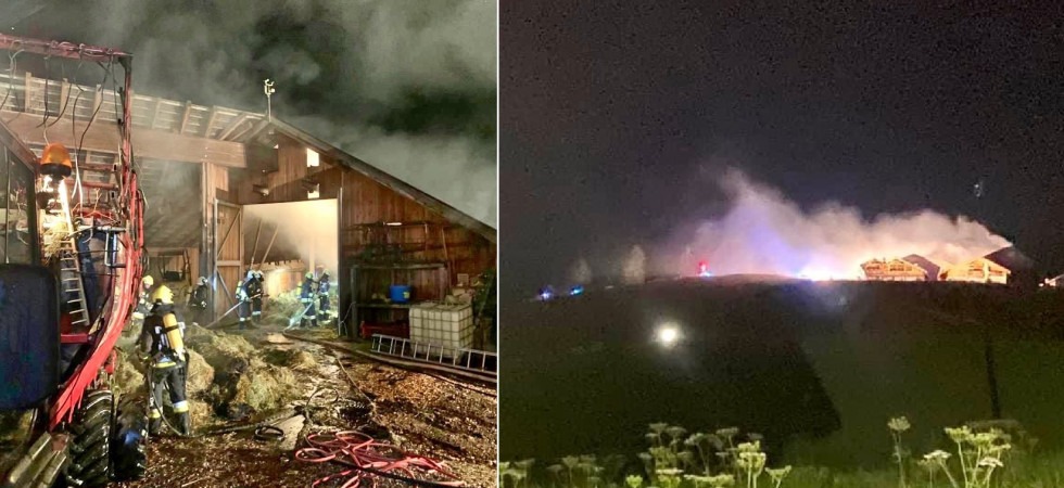 Una grossa colonna di fumo nella notte, in fiamme un fienile