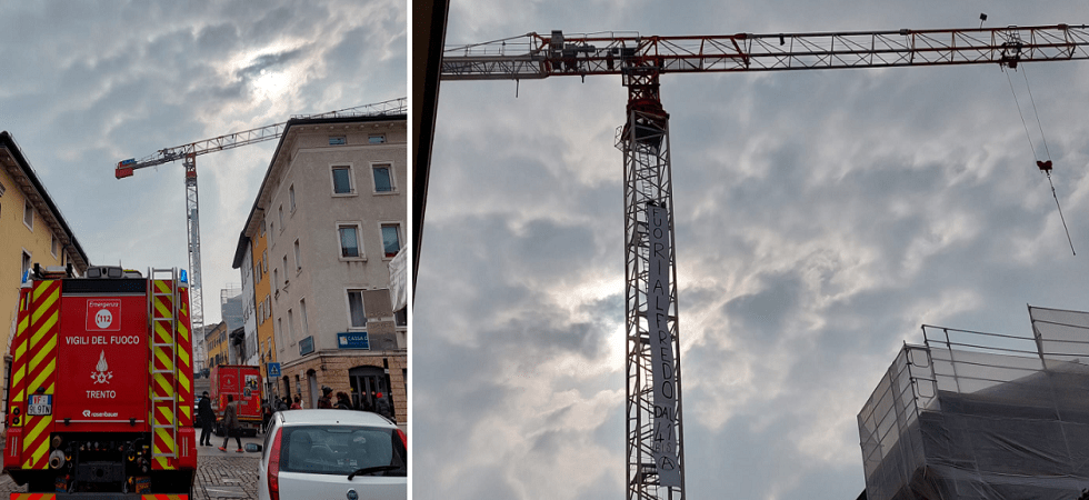 Altra protesta degli anarchici a Trento, striscione giù da una gru e strada bloccata: sul posto le forze dell'ordine