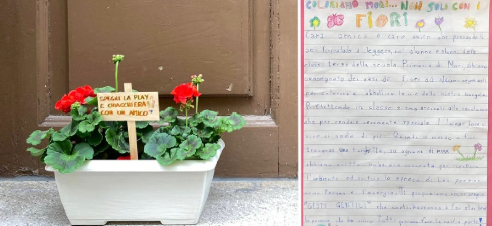 Vasi di fiori donati ai commercianti per "evitare gli sprechi e compiere gesti gentili"