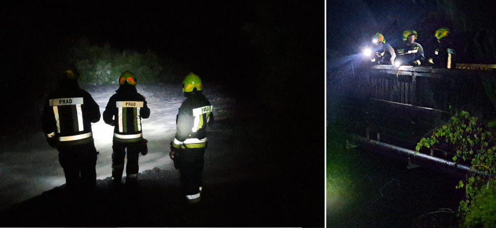 Fiume in piena e uno smottamento invade la strada, vigili del fuoco in azione