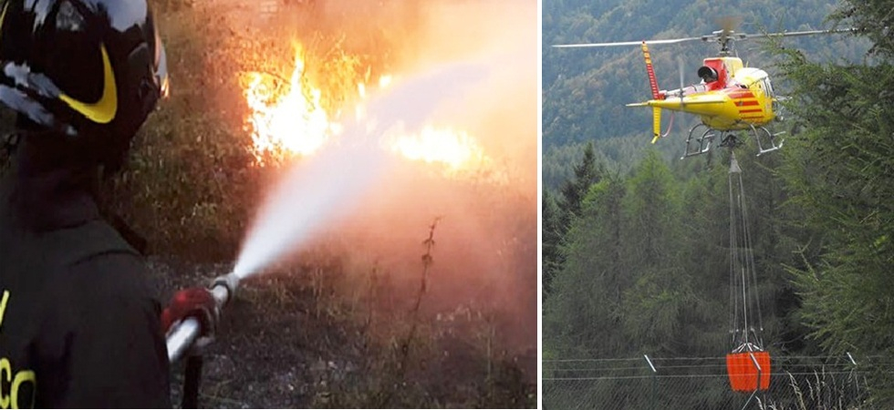 Foto d'archivio Incendio boschivo in una zona particolarmente impervia