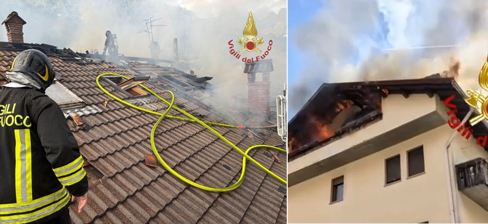 Fiamme dalla mansarda e si alza una colonna di fumo: vigili del fuoco in azione