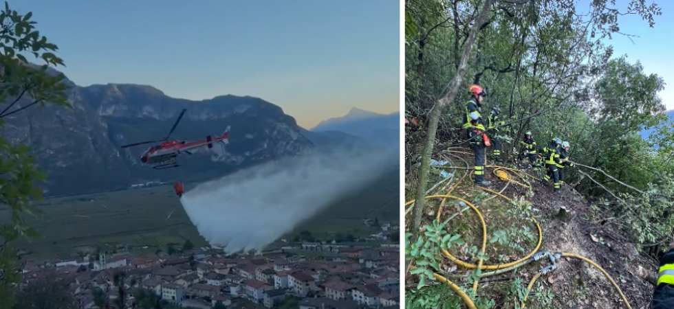 Le fiamme e il fumo visibile da grande distanza, incendio nel bosco non lontano dal paese