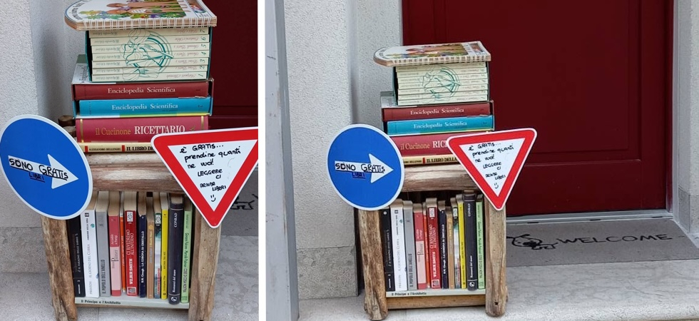 Un piccola 'montagna' di libri sugli scalini di casa: Tutti noi meritiamo una seconda occasione