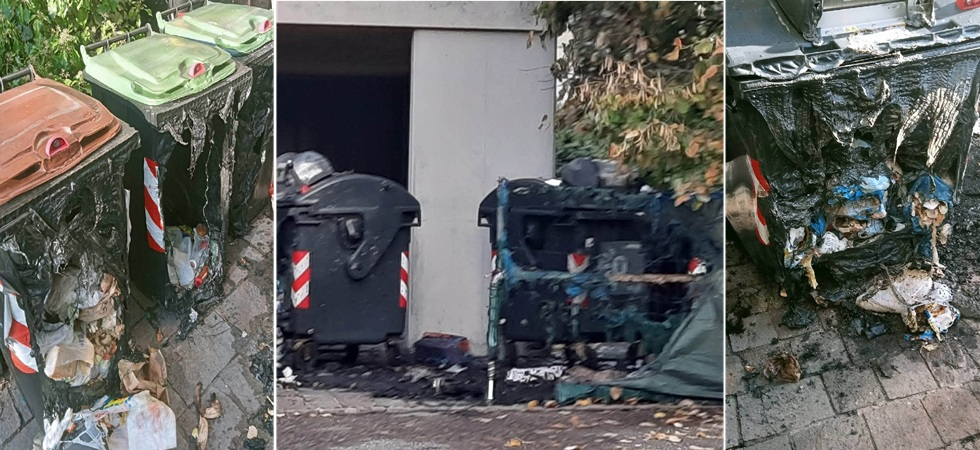 Cassonetti distrutti dalle fiamme e rifiuti sparsi ovunque: un’isola ecologica ridotta in cenere